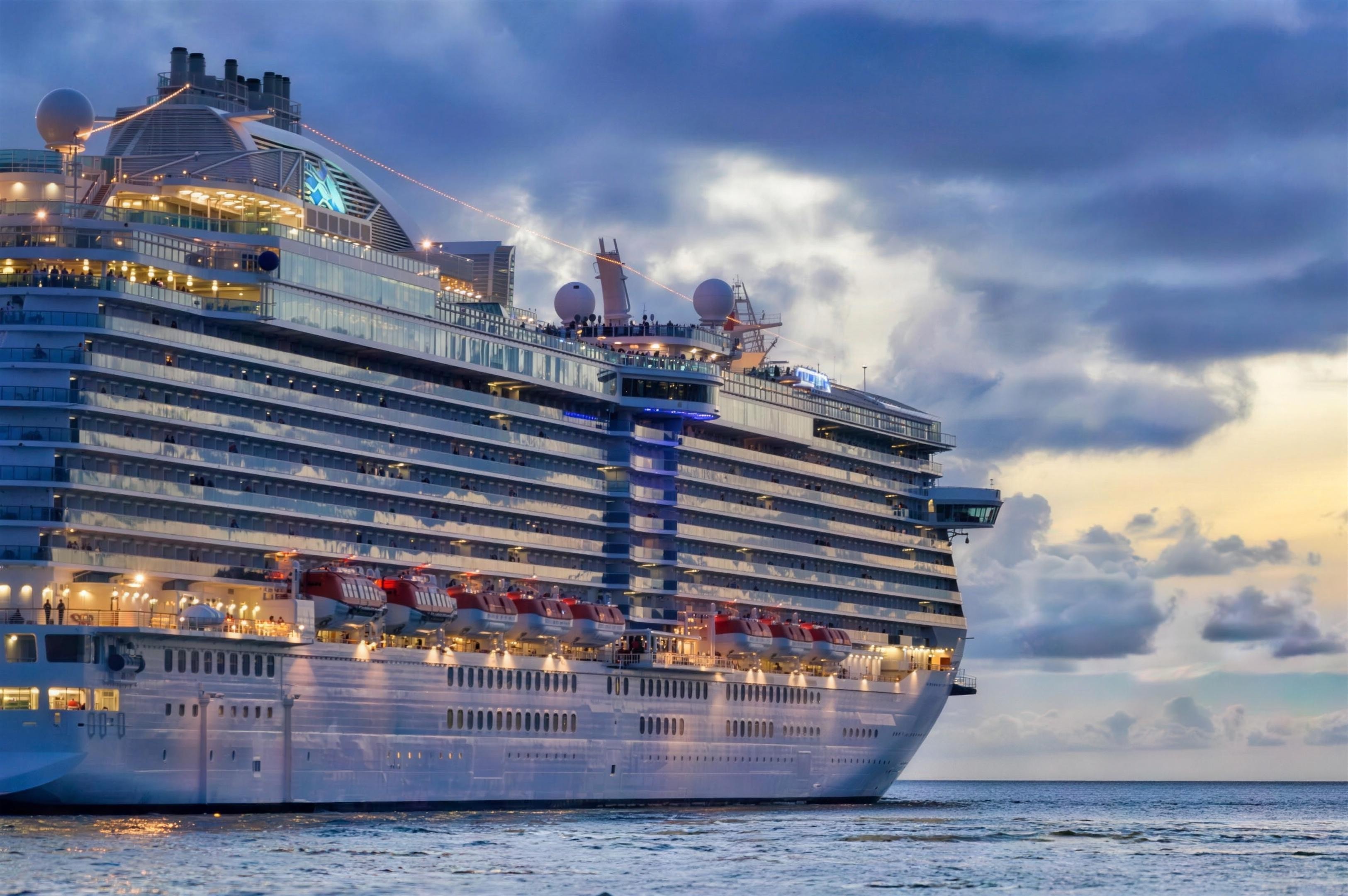 Cruise ship at sea at dusk